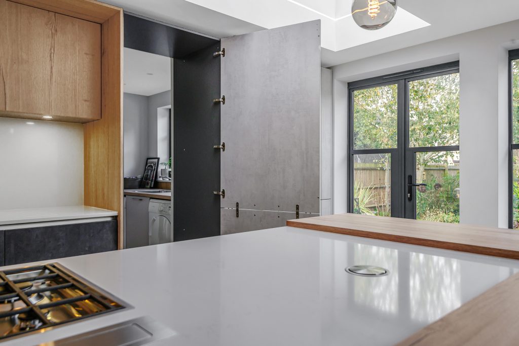 modern kitchen with secret door to utility