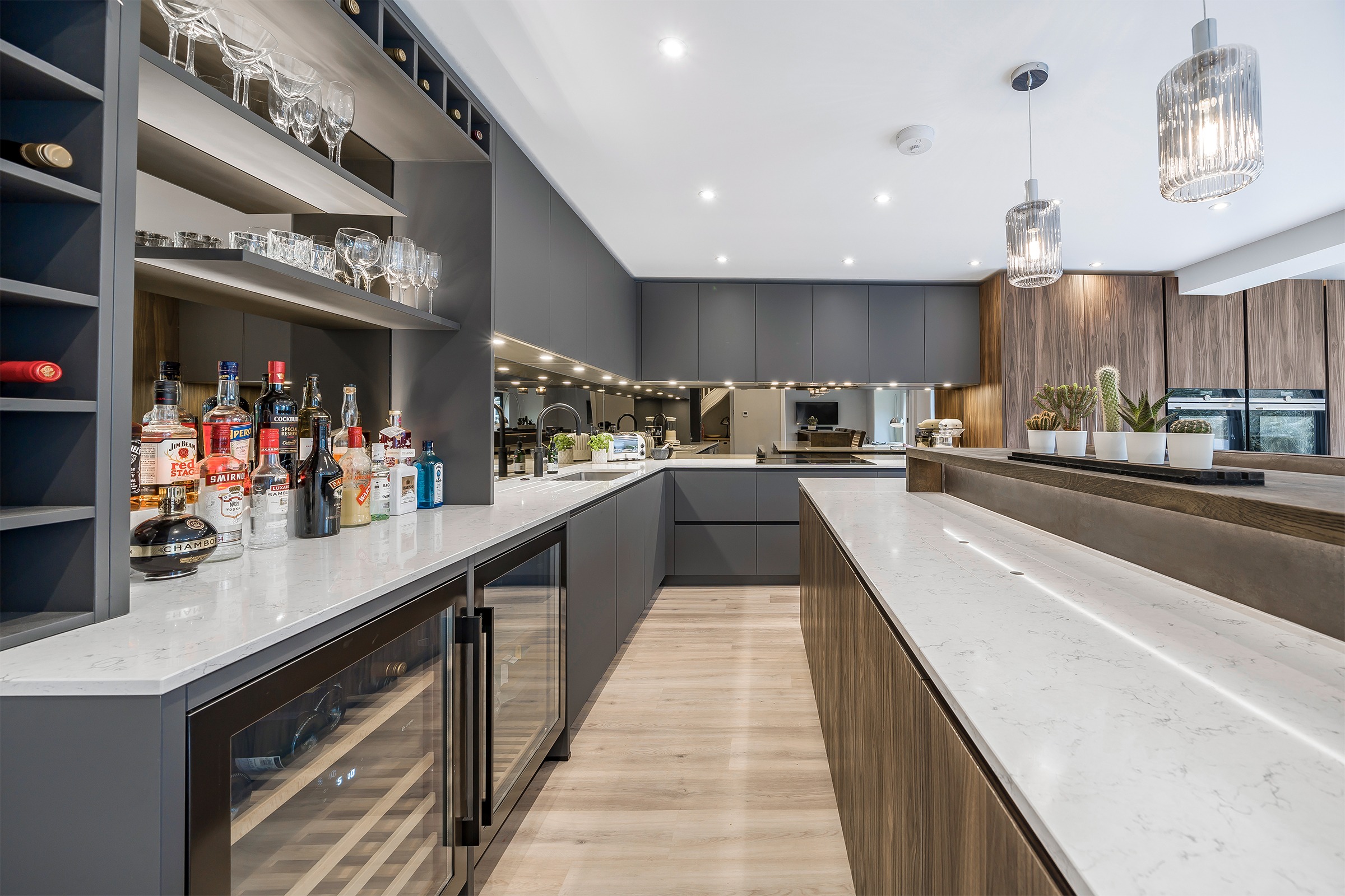 grey and wood contemporary kitchen with drinks bar