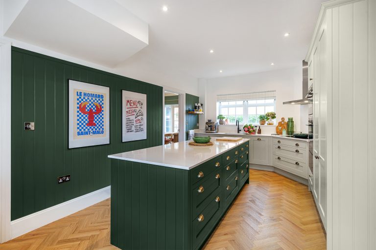 A racing green apothecary-style Island.