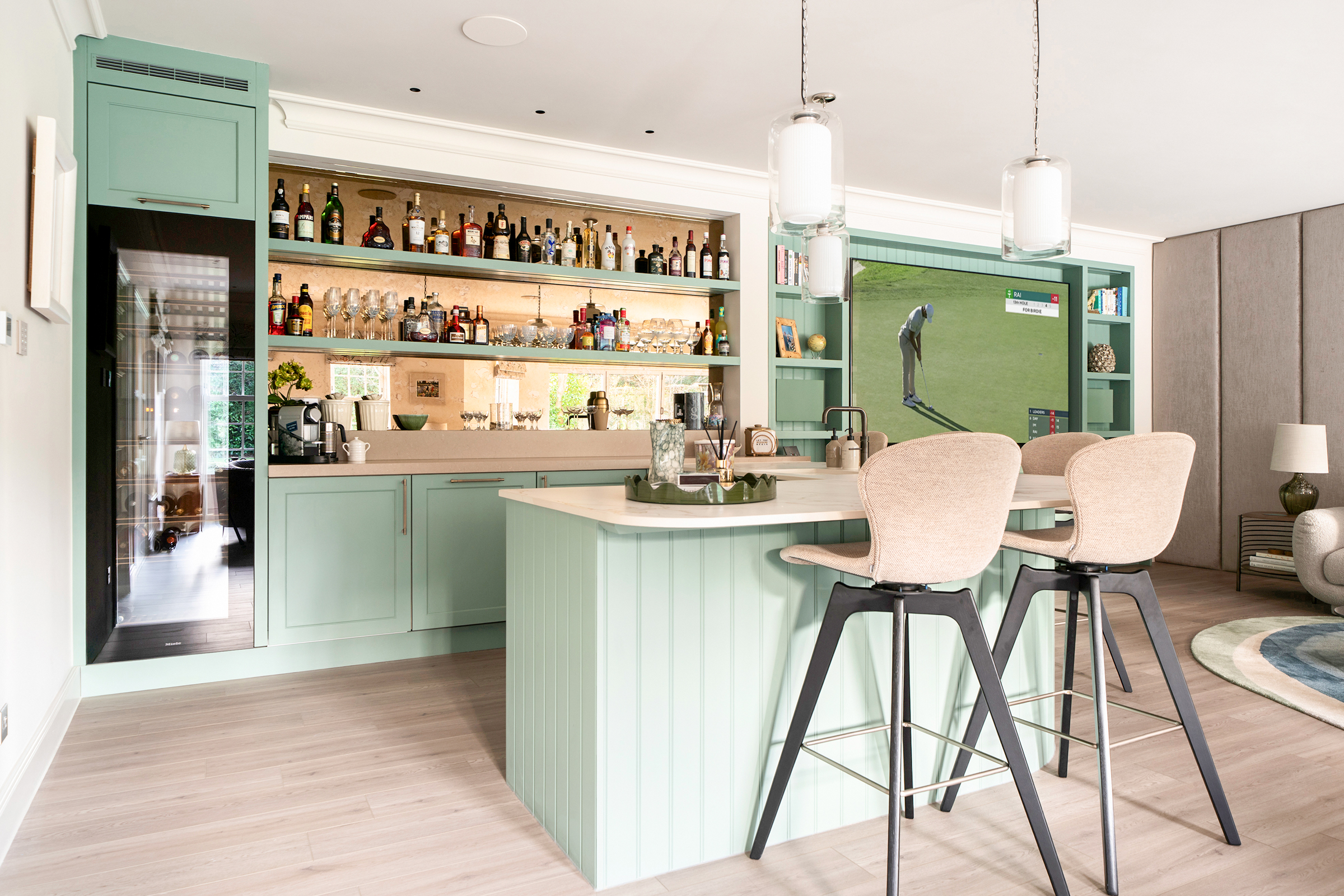 L-shaped home bar with wine cooler, open shelving and mirrored splashback.