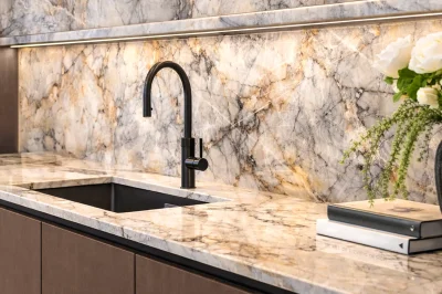 Modern stone splashback and shelving.